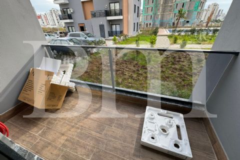 bm'den mezitli kuyuluk civ.havuzlu sitede 1+1 full eşyalı daire