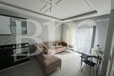 bm'den mezitli kuyuluk civ.havuzlu sitede 1+1 full eşyalı daire