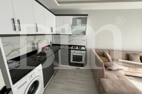 bm'den mezitli kuyuluk civ.havuzlu sitede 1+1 full eşyalı daire