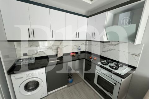bm'den mezitli kuyuluk civ.havuzlu sitede 1+1 full eşyalı daire
